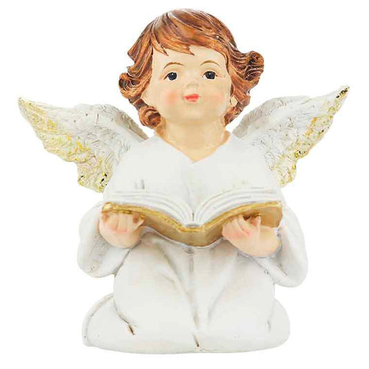 Little angel praying with book